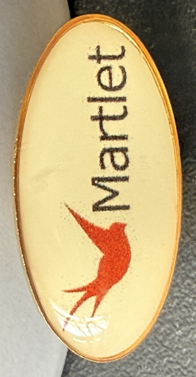 LP8 25mm oval pin badge printed with the Martlet logo