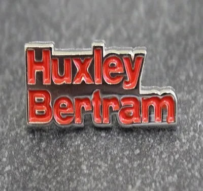Huxley Bertram red lettering die-struck enamel pin badge
